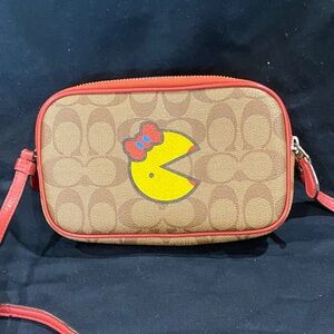Coach Brown Signature Canvas Crossbody with Red Trim and Yellow Graphic
